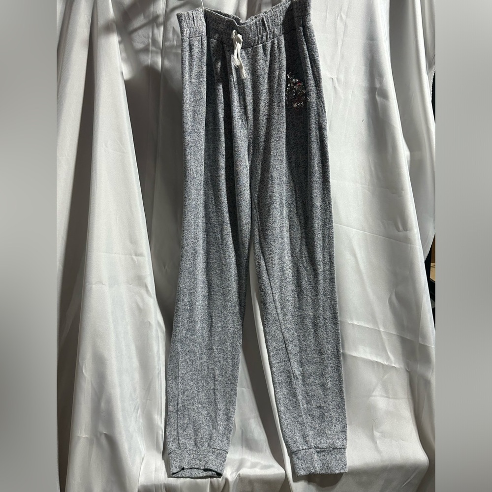 PJ gray pants with a star on them